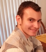 Portrait of young student smiling at camera